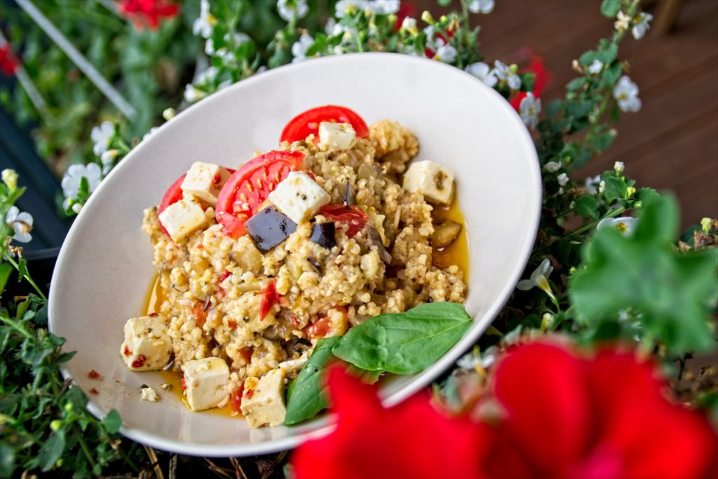 Millet with aubergine and tomato